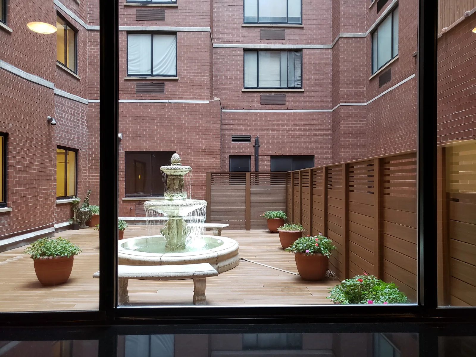Courtyard patio fountain by City Decks New York.