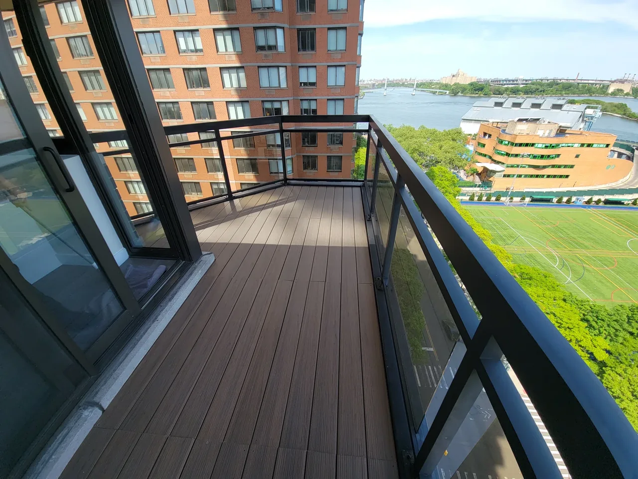 Upper East Side Manhattan balcony with TimberTech decking and a river view