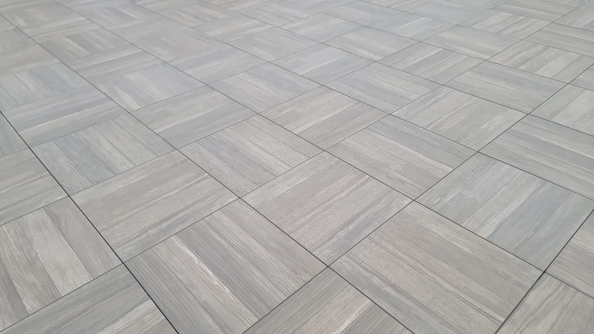 Wood-look porcelain paver surface showing board-like grain and joints